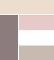 Canapé en tissu gris et coussins décoratifs à motifs fleuris. Kleurenpallet Vieux Rose