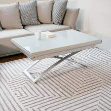 Is in great condition although it is considered used. Transforming Extending Glass Table Expand Furniture