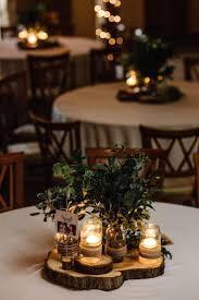 Pin By Evelyn Bharata On Wedding Decorations Rustic Wedding Centerpieces Wedding Cake Rustic Wedding Table Decorations