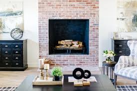 It creates a subtle contrast against white walls. Reclaimed Brick Fireplace Adds Character And Warmth To Modern Farmhouse Living Room Hgtv