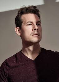 Close-Up Shot of a Man in Gray Turtleneck Sleeves · Free Stock Photo