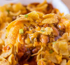 Cheesy Crunchy Frito Pie With Ground Beef Ranch Style Beans Cheese And Enchilada Sauce Baked W Beef Casserole Recipes Ground Beef Casserole Recipes Frito Pie