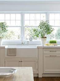 White farmhouse kitchen carrera marble countertops subway marble. Tan Kitchen Cabinets With White Marble Countertop Transitional Kitchen