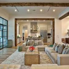 The Statement Piece Prosource Wholesale Rustic Wood Beams Ground This Modern Living Space In Timeless Character Home Sweet Home Home Living Room