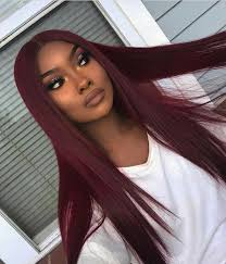 Directly in the middle of blue and red hair, there's a shade rarely explored by even the most adventurous hair guru: Burgundy Hair Dark Skin Girl Novocom Top