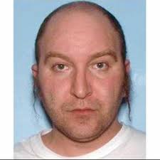 Covington man who fired back at Magnet store shooter called 'hero'