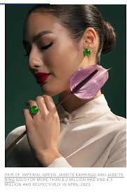 What factors might have driven the high price of this small lot of Tibetan  ornaments sold in Paris?