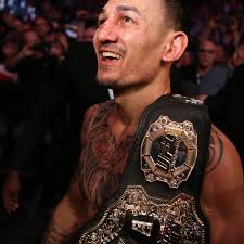 Winner of 14 straight in the featherweight division, ufc featherweight champion max blessed holloway owned the featherweight crown since december 2016. This Is How Max Holloway Called Out Tony Ferguson For Interim Ufc Lightweight Title Bout Bloody Elbow