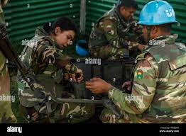 U.N. peacekeepers from Bangladesh set up metal detectors in preparation for  a field training exercise