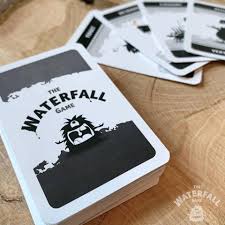 Everyone sits around a deck of cards. The Waterfall Game Home Facebook