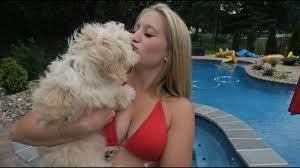Woman makes love to her dog