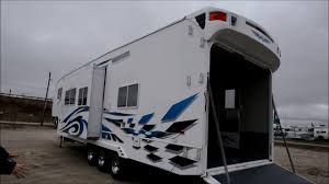 It's a luxury 5th wheel and a toy hauler. Sold 2008 Weekend Warrior Used For Sale Toy Hauler Rv Camper Trailer Ramp Door Garage Youtube