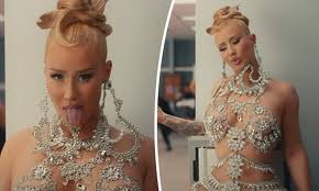 Iggy Azalea poses NAKED in nothing but a bejewelled bodysuit and raps about  receiving oral sex in raunchy music video for new single Money Come | Daily  Mail Online