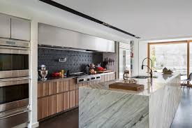 The stainless steel toe kick, hardware and range. Boffi Georgetown Updates Kitchen For Professional Chefs