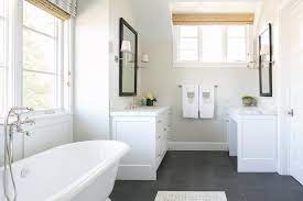 The bathroom is associated with the weekday morning rush, but it doesn't have to be. White Bathroom With Slate Floor Transitional Bathroom