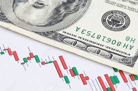 us dollar banknote on the candlestick stock chart