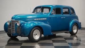 Image result for Trojan Maroon 1939 Oldsmobile