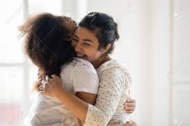 And hugs from best friends are like warm baths after a long day. Happy Diverse Best Friends Hugging And Laughing Greeting Sudden Stock Photo Picture And Royalty Free Image Image 132161413