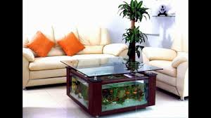 Using an old repurposed wooden table with having round top will also be a decent option to save the budget for this project. Fish Tank Designs For Small Living Room Novocom Top