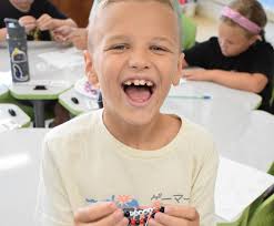 In keeping with an annual tradition, fourth graders at Seaford Manor  Elementary School celebrated the fourth day of the school year. Students  from the four classes made “One Word” bracelets, worked on