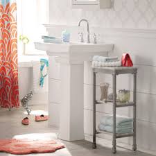 This bathroom has concrete rear walls and glass in the bathroom, a recessed medicine cabinet is mounted over the pedestal sink. Pedestal Sink Storage Ideas Midcityeast Diy Home