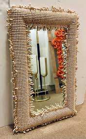 Currey & Co. Modern Beige Wooden Bead Jeanie Wall Mirror