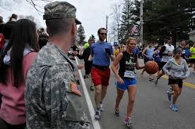 U.S. Army Pfc. Matthew Knowlton, left, a military policeman