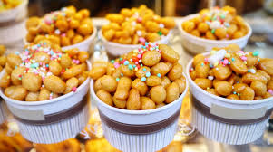 Remove the glass from the center of the platter and serve. Struffoli Napoletani Il Giornale Del Cibo