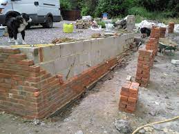 Brick Retaining Wall Google Otsing Landscaping Retaining Walls Brick Garden Brick Wall Gardens