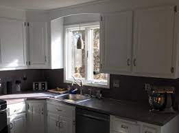 Repainting works best with wooden cabinets, and worst with laminate, because of if you're painting wooden cabinet doors, the grain will show through if you go straight into priming and painting. Kitchen Cabinet Painting And Refinishing In Connecticut Project Photos Southington Painting