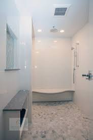 Open shower designs give you the freedom to experiment new styles, as seen in the open shower above, which transitions seamlessly into the bedroom and closet as well. Transitions Kitchens And Baths Why Choose An Open Shower Design