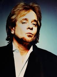 Can't Keep A Good Man Down”. -Eddie Money -Mrs.$