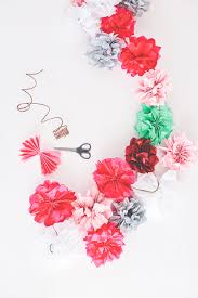 Cut 2 to 3 strips of green tissue paper and twist together at one end. Fun And Festive Tissue Paper Flowers A Subtle Revelry