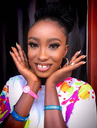 Doyinola hair making and cake.