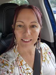 Can someone edit this photo to remove the car and slide from the background?