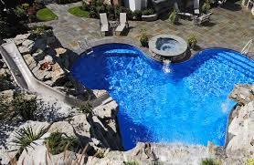 A Crystal Clear Pool With A Spillover Spa Water Features And A Water Slide Can T Get Much Better Than That Design By Crystal Clear Pools Water Slides Pool