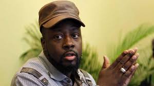 Bullet grazes Wyclef Jean's hand in Haiti