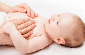 Slowly place your baby in the bath, feet first, while supporting their head and neck above the water. Baby Bath 5 Things To Take Care In Winters Before Giving Bath To A Baby