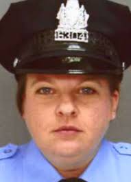 Michelle Winkis, 42, captain's aide in the 26th police district.
