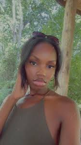 LOST DOG AND PUPPIES ** My grandparents white full grown American pit and  two of her puppies got out this morning in North Spring subdivision. Please  be