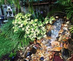 How to build a waterfall in your garden. Build A Backyard Waterfall And Stream Step By Step Guide Backyard Sidekick