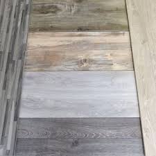 Pin By Neelam Iqbal On Flooring House Flooring Grey Hardwood Floors Grey Flooring
