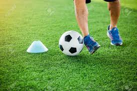 Chest trap is a skill that involves a player using their chest to gain control over the ball that is approaching them high in the air. Soccer Player Put Blue Sport Shoes To Jogging With Trap And Control Football Between Cone Markers For Football Training Stock Photo Picture And Royalty Free Image Image 120398830