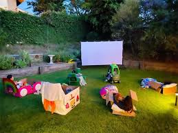Setting the stage for memorable nights on the patio. 15 Backyard Movie Night Ideas