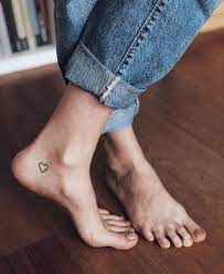 Friendship music love heart foot tattoo. Pin By Christine Crafton On Tattoo Romantic Tattoo Small Heart Tattoos Foot Tattoos