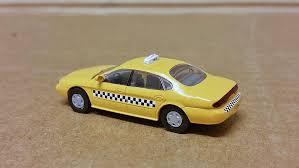Image result for Yellow 1990 Taxi