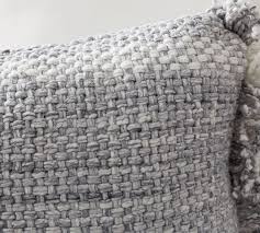 Outdoor pillows are the essential finishing touches for spaces that for alfresco dining, choose lumbar pillows that provide back support and visual interest with their unusual shape. Ixora Eco Friendly Textured Indoor Outdoor Lumbar Pillow Pottery Barn