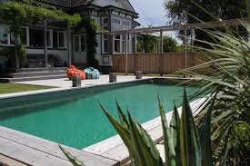 The Owner Required Their Park Like Organic Garden Stately Victorian Home To Be Complemented By A Living Pool The Outcome Natural Pool Pool Rectangular Pool