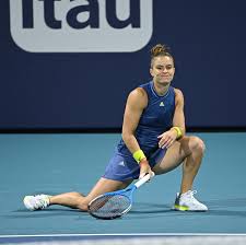 Her arms look masculine only when she flexes her muscles during a tennis game. Maria Sakkari Facebook