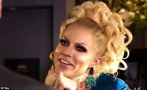 Courtney act, a former finalist on rupaul's drag race in 2014 and semifinalist on australian idol in 2003, tackles gender boundaries in her dramatic music video for ugly. the singer snags a handsome fellow, who resists her advances after finding out she's in drag attire. Drag Queen Courtney Act Brings A Touch Of Fabulous To Neighbours In Celebration Of Pride Month Readsector